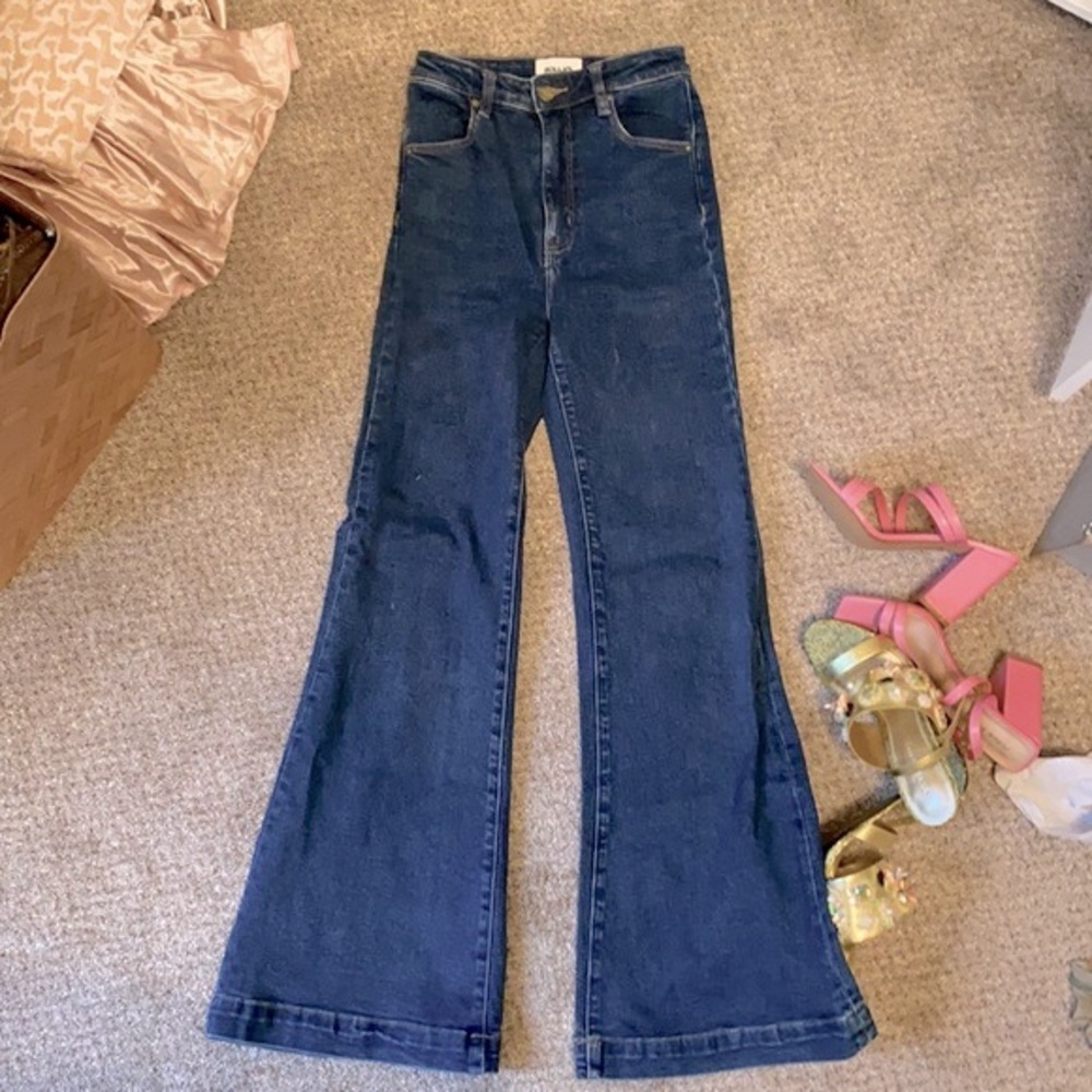 High waisted flare dark denim rolla jeans from free people